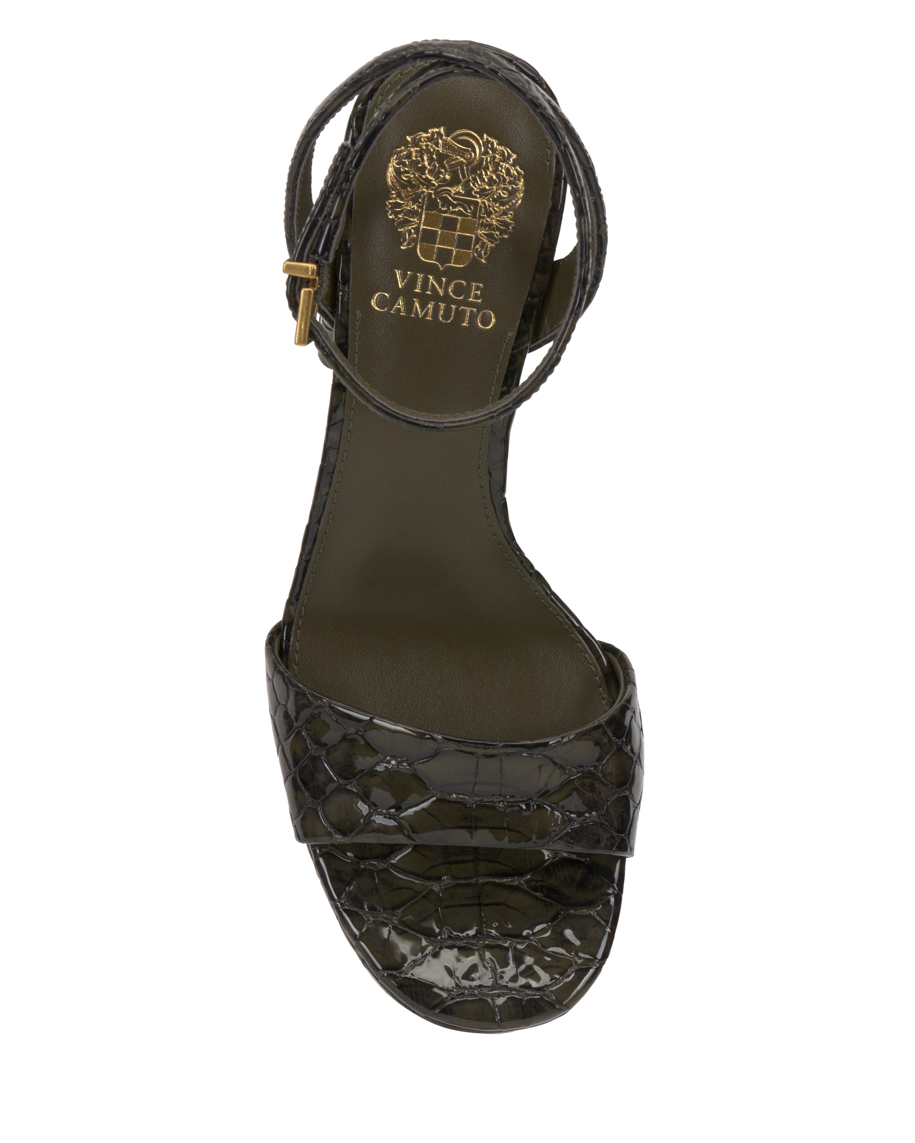 The Vince Camuto Pendry Platform Sandal is a black, crocodile-textured, open-toe heel with an ankle strap and gold buckle, featuring subtle ’70s style and the Vince Camuto logo in gold on the insole.