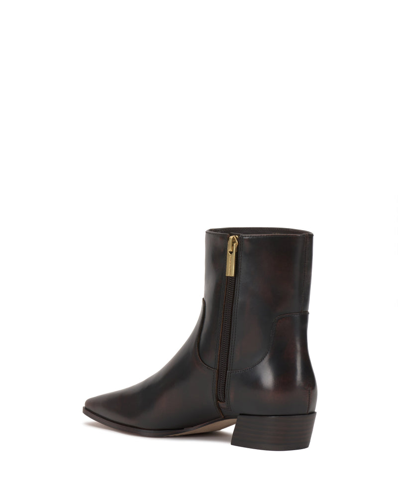 Dark brown Pertula Bootie by Vince Camuto featuring a block heel, side zipper, and pointed toe, shown against a white background—a chic footwear choice.