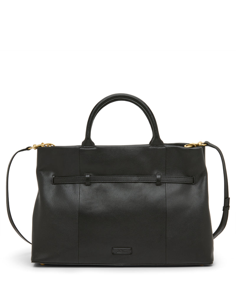 The Rilah Satchel Bag by Vince Camuto is a black leather handbag featuring two handles, a detachable shoulder strap, minimal detailing, structured shape, subtle stitching, and a small brand logo on the front.