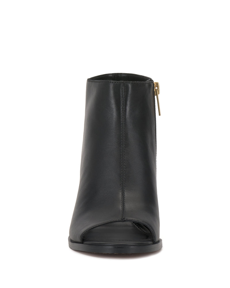 Front view of the Vince Camuto Rimdia Sandal, a black peep-toe ankle boot with a gold side zipper and smooth leather finish on a stylish block heel.