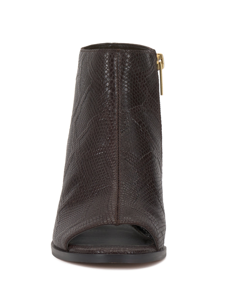 The Rimdia Sandal by Vince Camuto features a dark brown, peep-toe design with a snakeskin-textured pattern, gold side zipper, and a chic block heel.