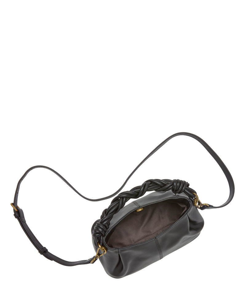 The Vince Camuto Sadyy Crossbody Bag features black leather with a braided handle, gold hardware, and a long adjustable strap. Shown open, this modern crossbody reveals a spacious interior with a brown lining—making it the perfect accessory for any occasion.