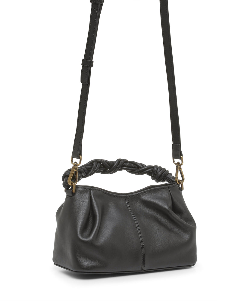 The Sadyy Crossbody Bag by Vince Camuto features black leather with a twisted handle, an adjustable shoulder strap, and gold hardware. Its soft yet slightly structured shape is accentuated by visible stitching details, making it a contemporary choice for a modern crossbody. With its versatile design, this bag easily enhances any outfit.