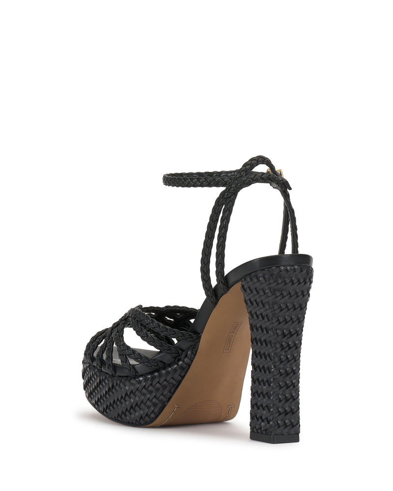 The Vince Camuto Samlee Strappy Platform Sandal is shown from the back right on a white background, featuring black woven straps, an ankle strap, and a chunky block heel.