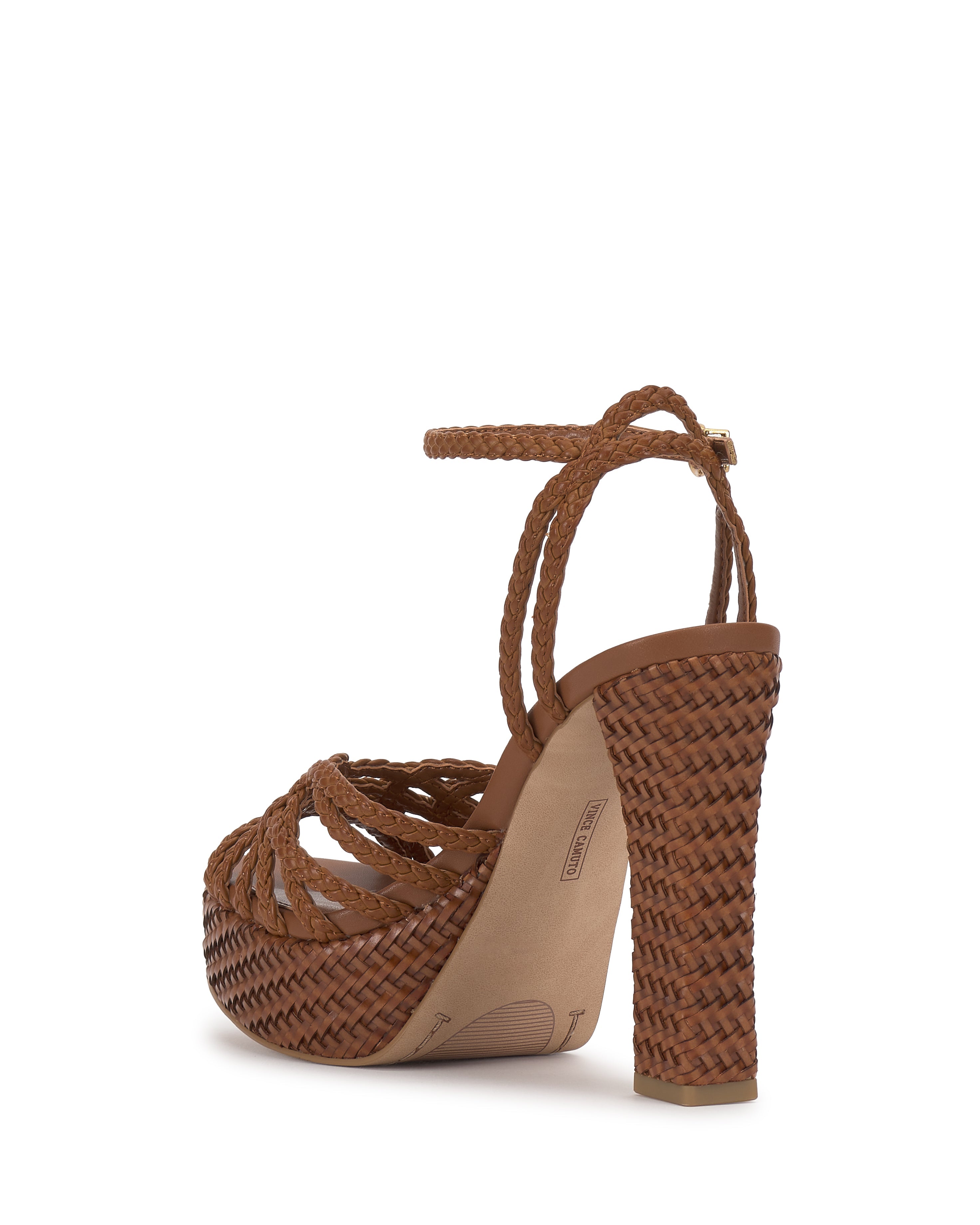 The Vince Camuto Samlee Strappy Platform Sandal is shown from the back on a white background, highlighting its brown braided woven design, adjustable ankle strap, and chunky block heel.