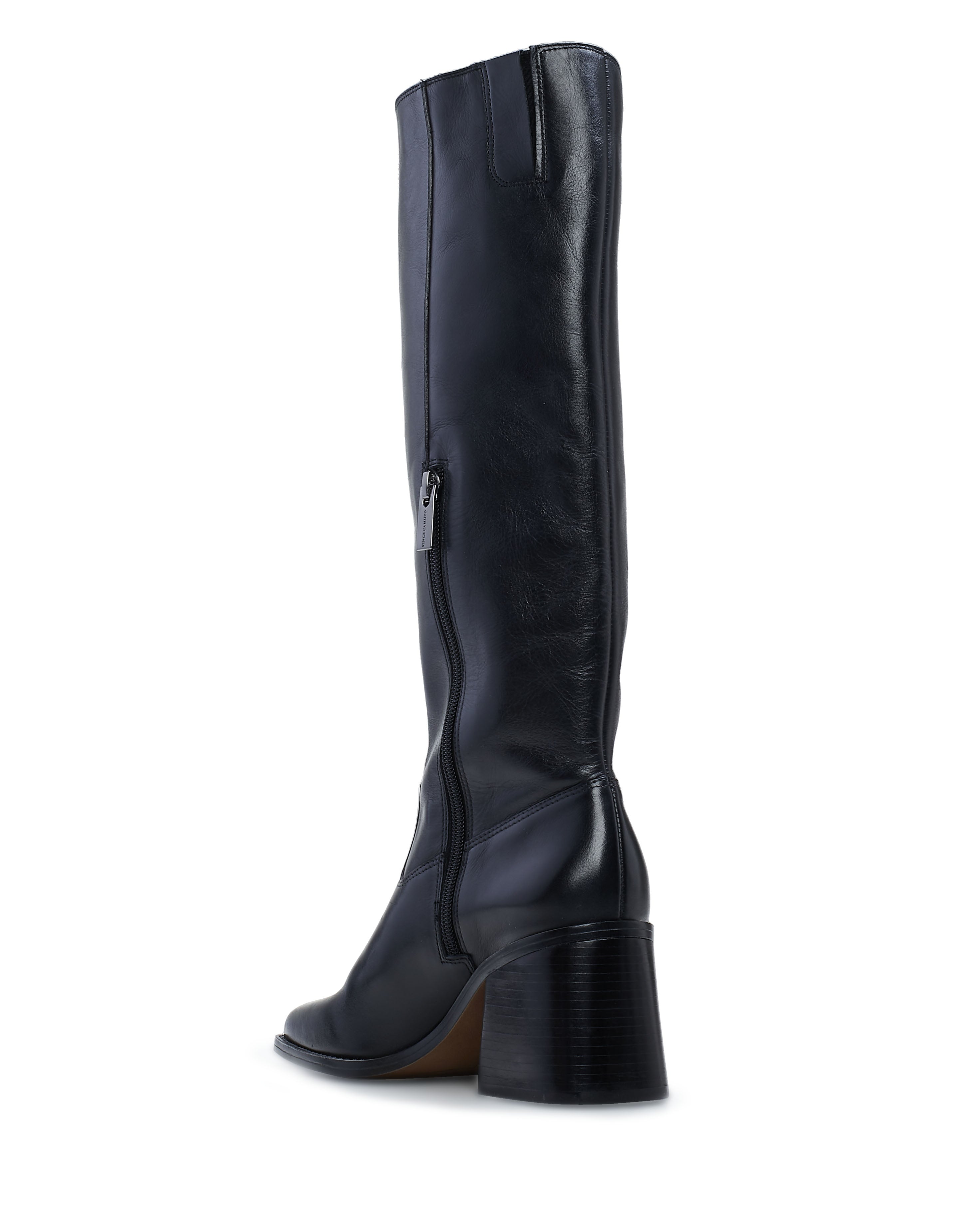 The Vince Camuto Sangeti Extra Wide Calf Boot is a black knee-high leather boot with a side zipper, rounded toe, and chunky mid-height block heel, shown from a rear side angle on a white background. Ideal for stylish wide-calf comfort.