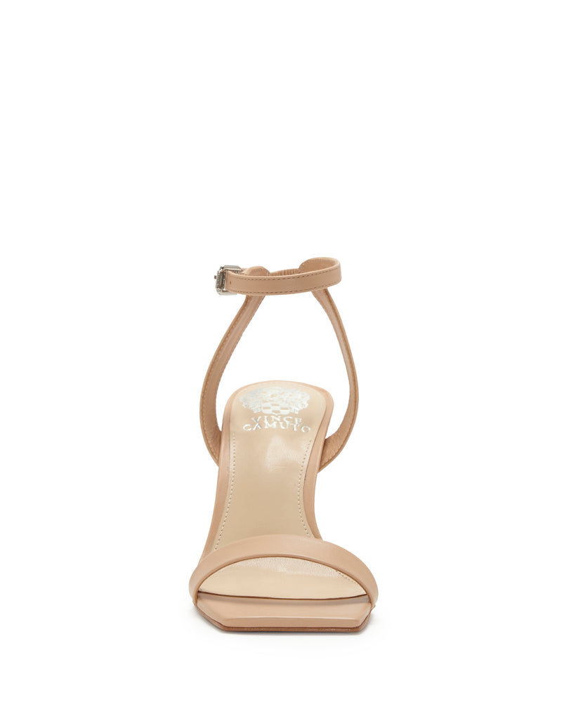 The Saprenda Sandal by Vince Camuto is a nude open-toe high heel with a single toe strap and an ankle strap with a small buckle.
