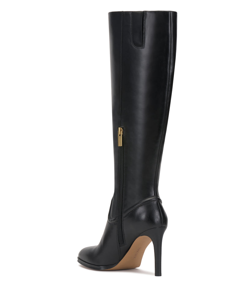 The Sareya Wide Calf Knee High Boot by Vince Camuto is a tall black leather boot featuring a high heel, pointed toe, gold side zipper, and light brown sole, displayed from a side angle against a white background.