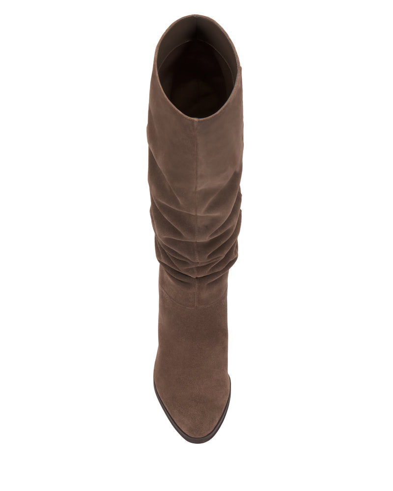 Top view of a single Vince Camuto Sorina Wide Calf Knee High Boot in brown suede, featuring a pointed toe and ruched shaft, photographed on a white background.