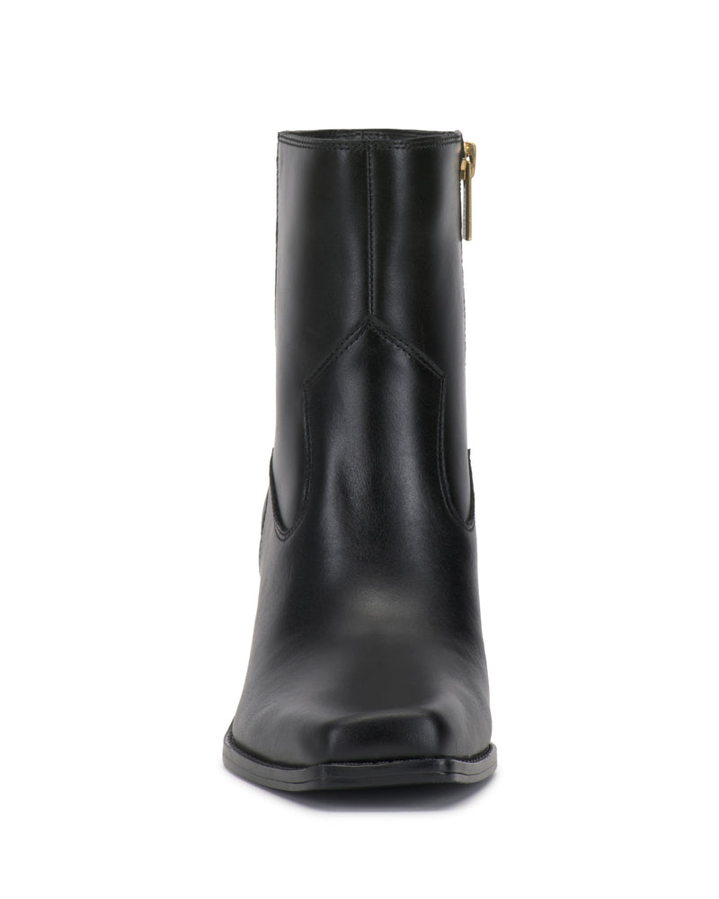 Front view of the Sybren Bootie by Vince Camuto in black leather, showcasing a subtle seam design, a chunky block heel, and a gold side zipper for modern sophistication.