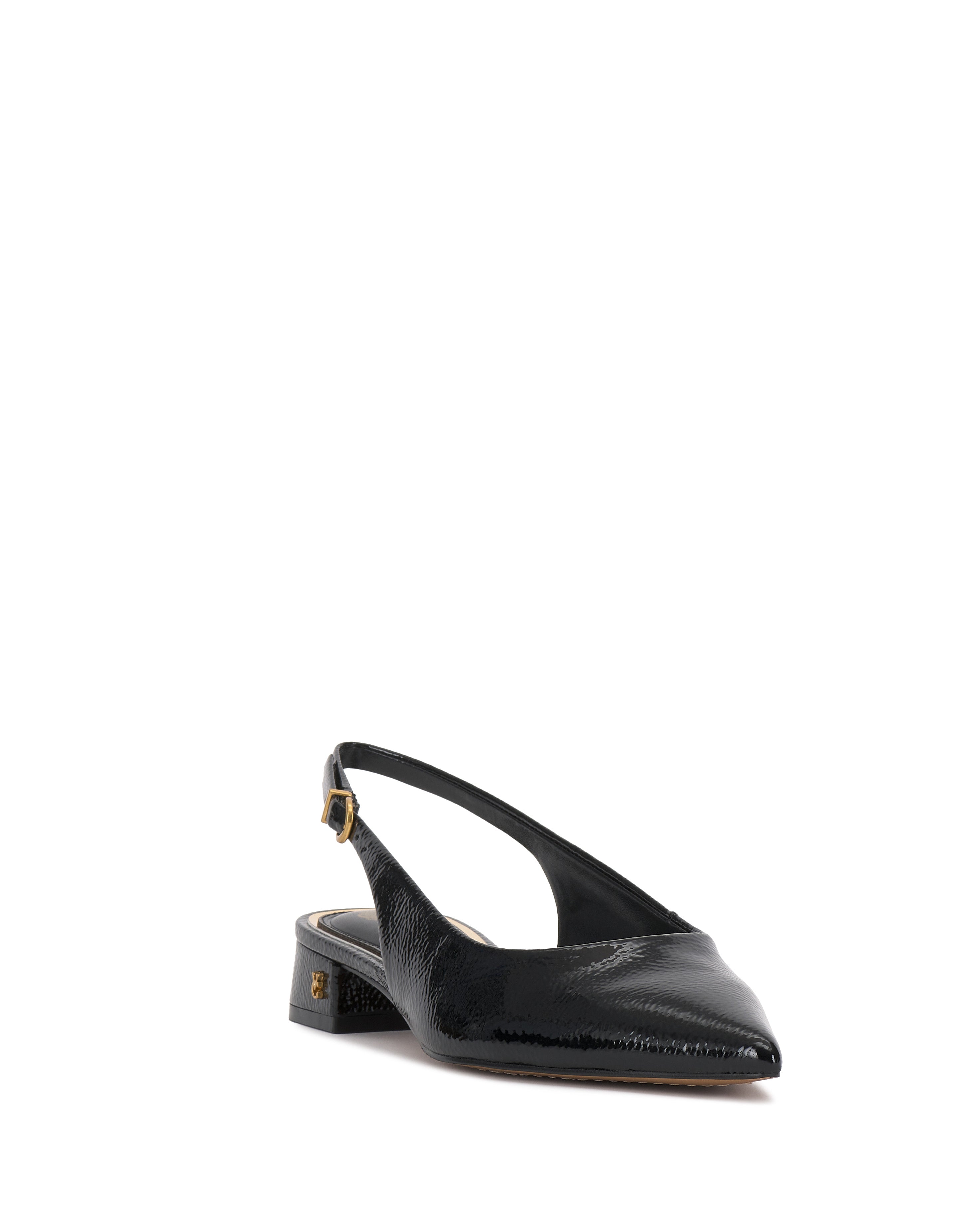 The Valiey Slingback Pump by Vince Camuto is a black patent leather mule with a pointed toe, low block heel, and gold buckle detail, shown on a white background.