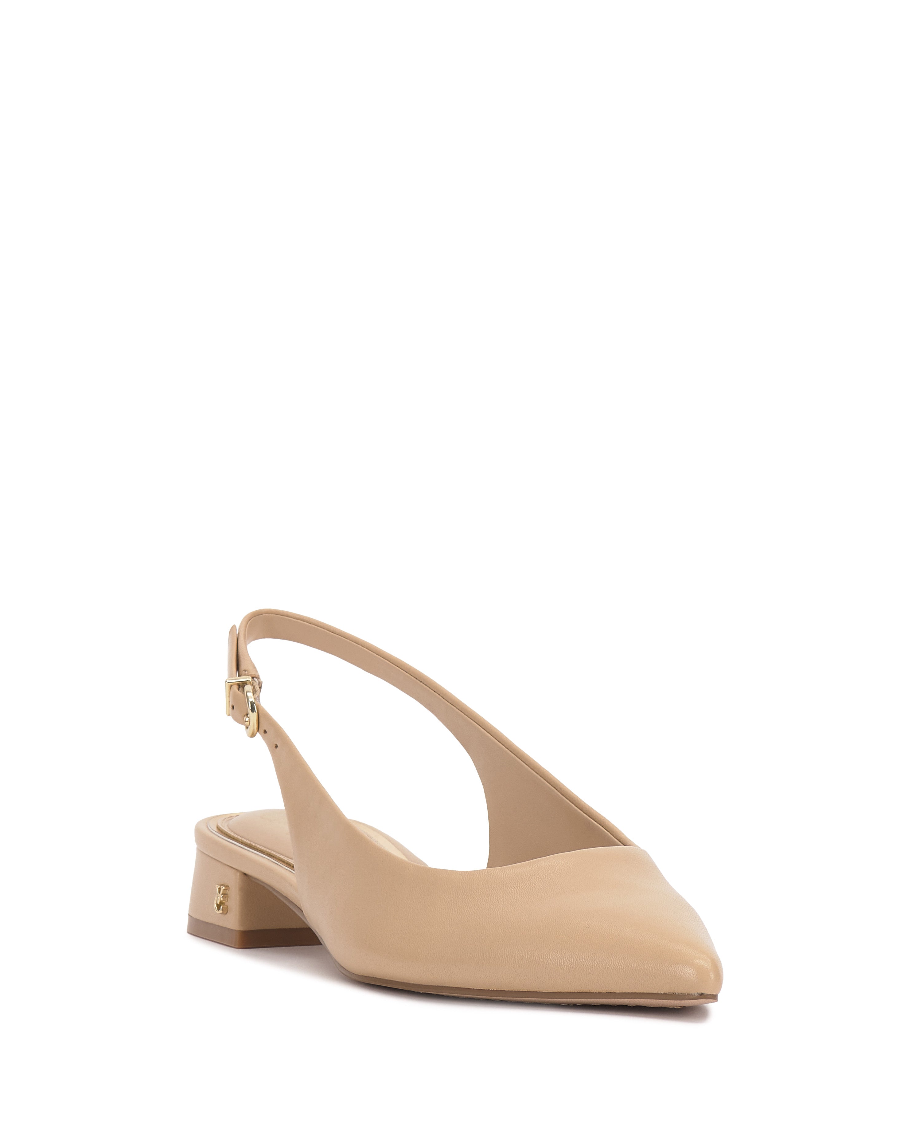 The Valiey Slingback Pump by Vince Camuto is a beige pointed-toe mule flat with a low block heel, gold buckle strap, and minimalist design, displayed on a white background.