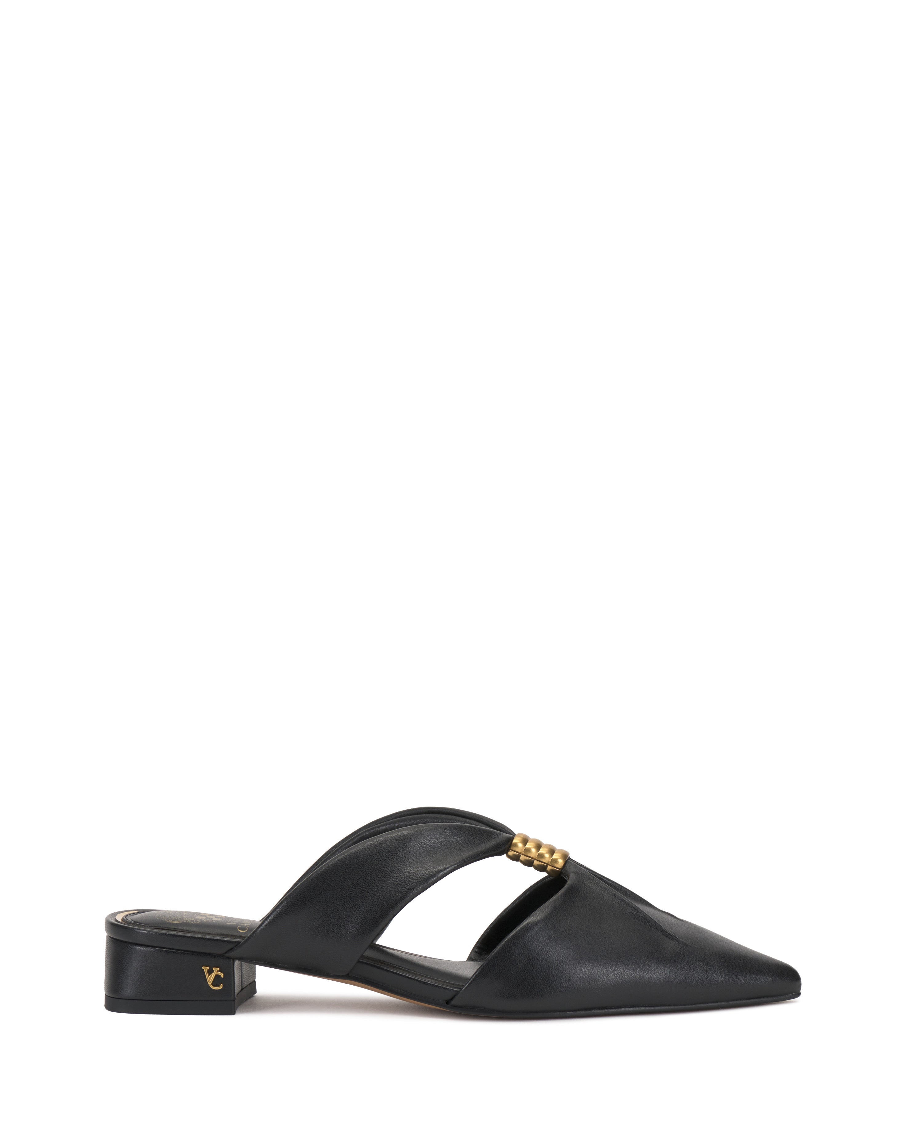 The Vince Camuto Vanika Mule showcases a black leather finish, low block heel, pointed toe, gold bead detail on the upper, and open side design.