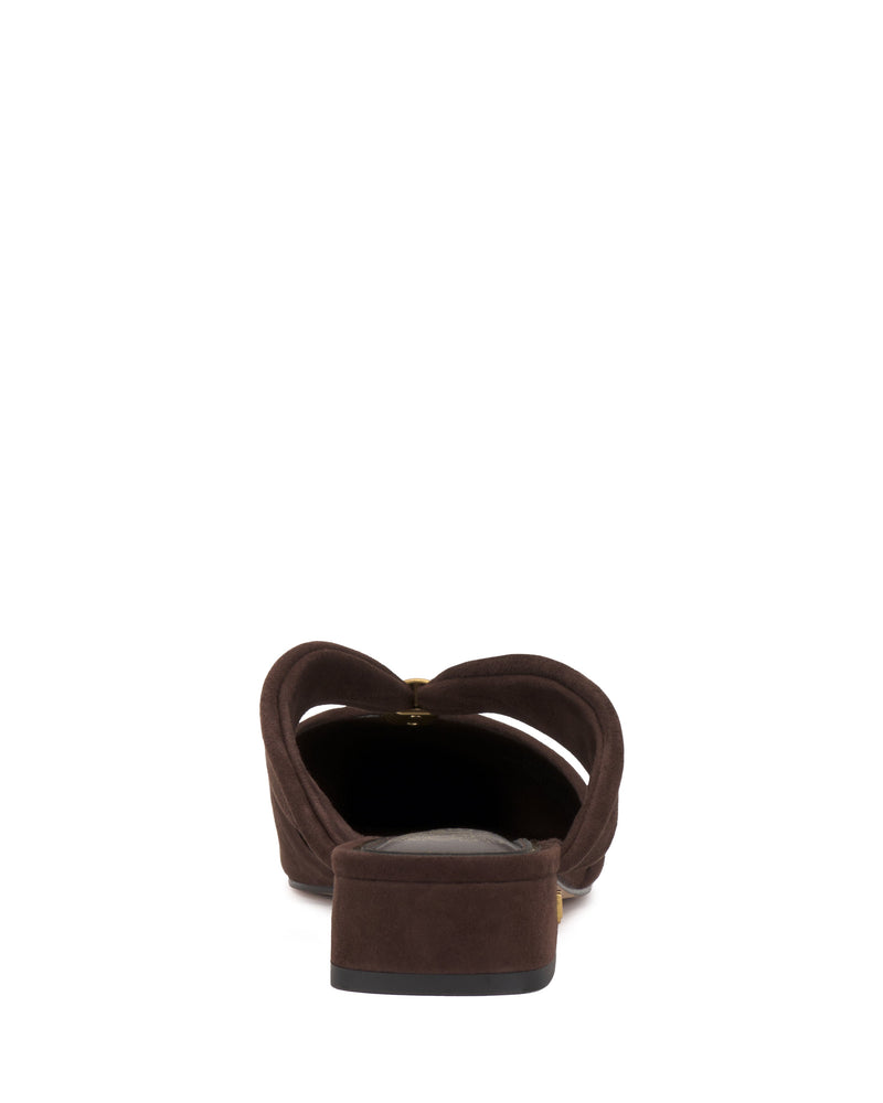 Back view of the Vince Camuto Vanika Mule, featuring a brown color, low block heel, heart-shaped upper, pointed toe, and black sole on a white background.