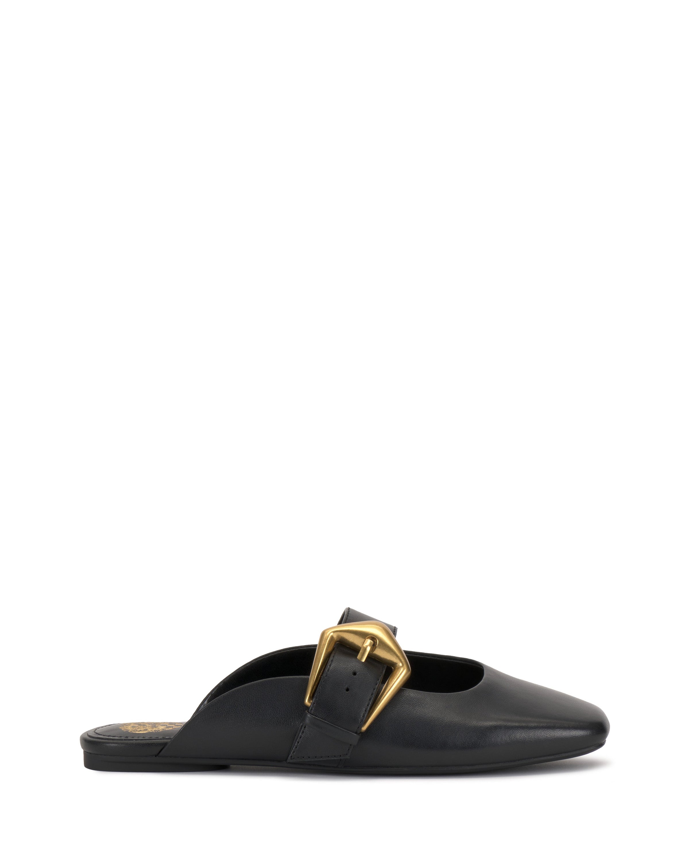 The Vellma Buckle Mule by Vince Camuto is a black leather flat mule with a pointed toe and a bold gold buckle on the side, displayed in profile against a plain white background.