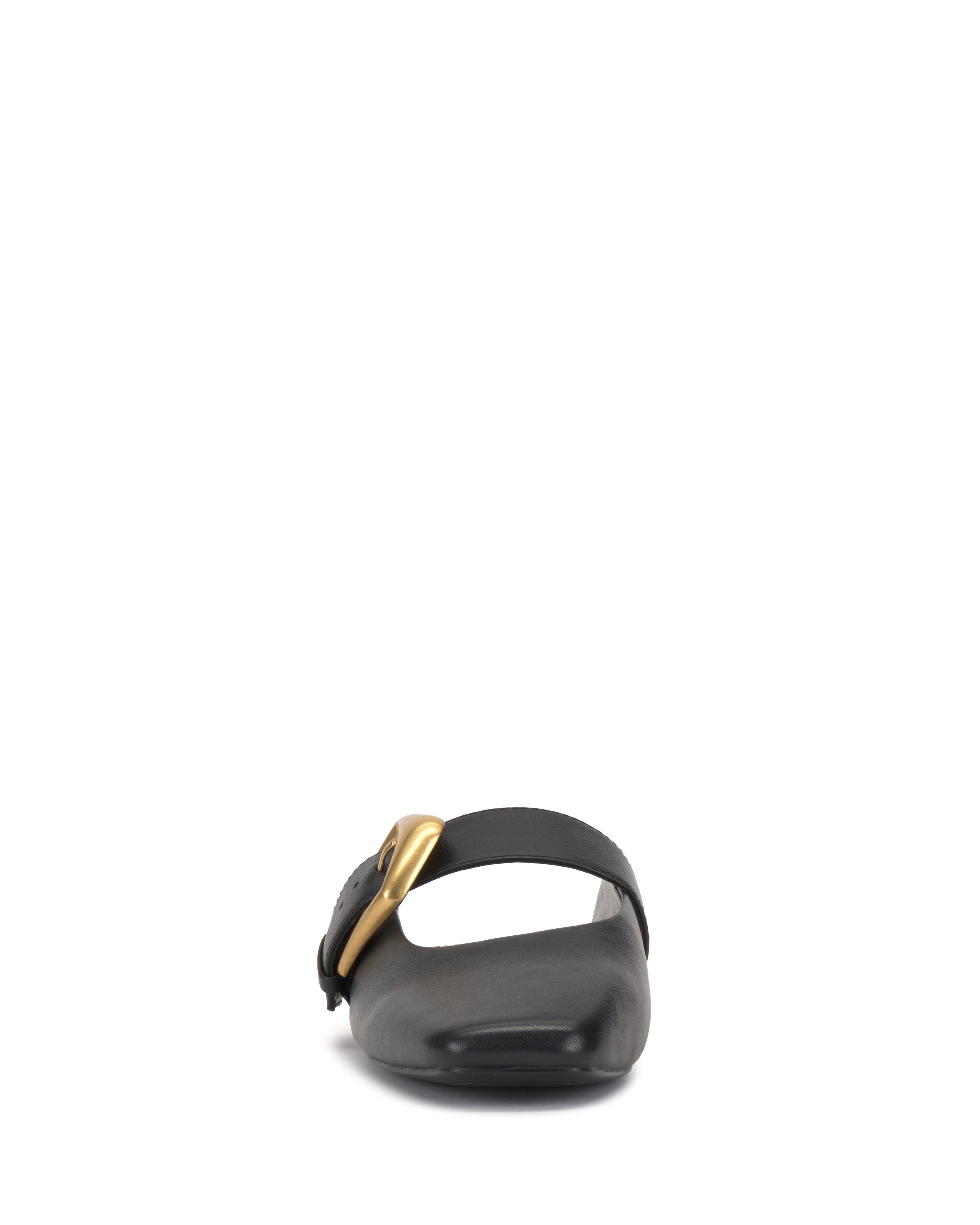 Front view of the Vince Camuto Vellma Buckle Mule, a black leather slip-on sandal featuring a wide strap and prominent gold buckle, shown against a plain white background.