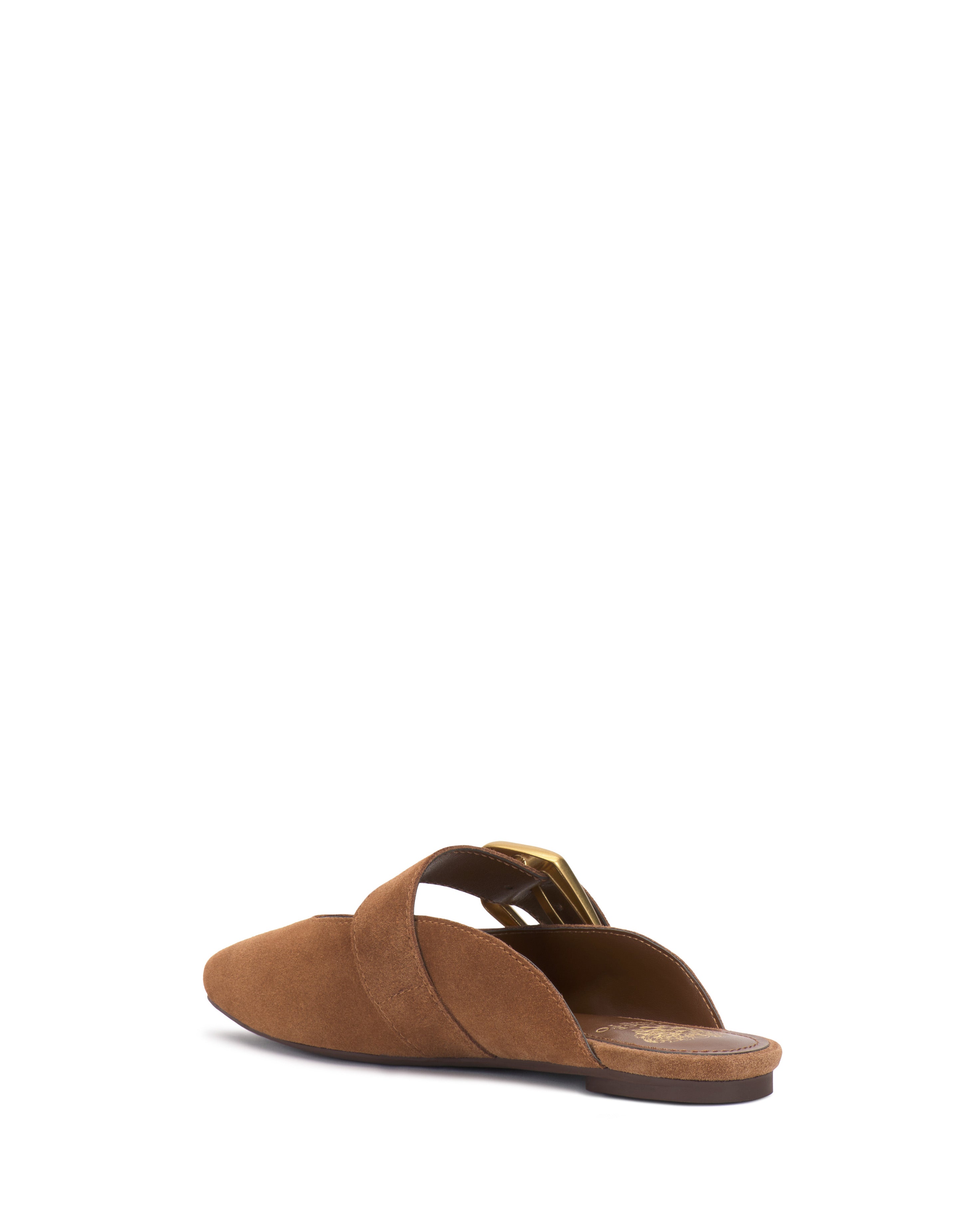 The Vince Camuto Vellma Buckle Mule is a brown suede slip-on flat with a pointed toe and low heel, shown from the back at an angle against a plain white background.