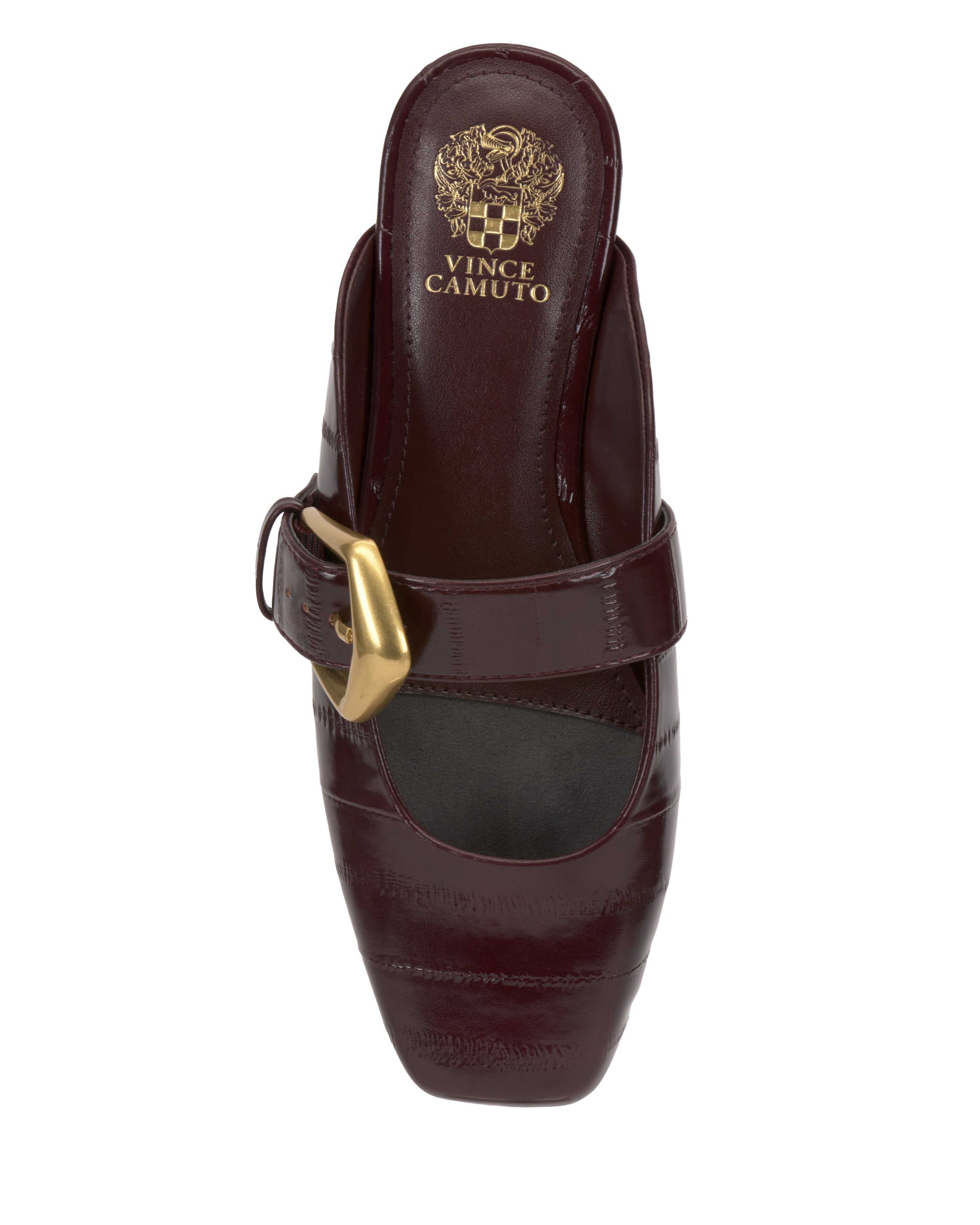 Top view of the Vellma Buckle Mule by Vince Camuto: a burgundy heeled shoe with a square toe, patent finish, wide strap with gold-tone buckle, and gold brand logo on the insole.