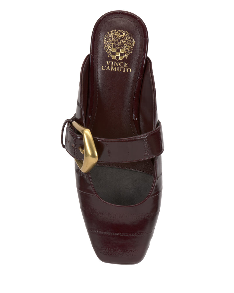 Top view of the Vellma Buckle Mule by Vince Camuto: a burgundy heeled shoe with a square toe, patent finish, wide strap with gold-tone buckle, and gold brand logo on the insole.