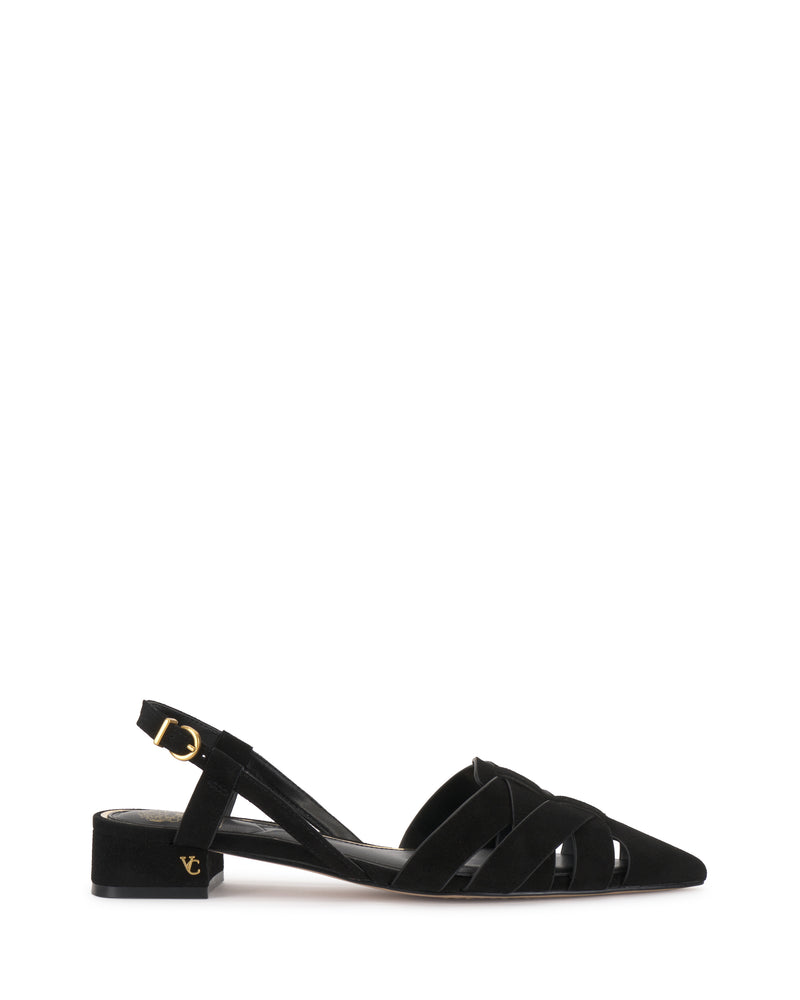 The Vinesha Sandal by Vince Camuto is a black suede slingback with crisscross front straps, a low block heel, gold buckle, and a small gold logo detail on the heel.