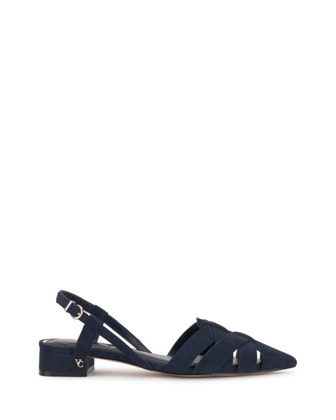 The Vinesha Sandal by Vince Camuto is a navy blue suede slingback with a low block heel, pointed toe, crisscross front straps, metallic logo near the heel, and an adjustable ankle strap.