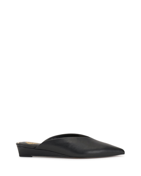 The Vinia Mule by Vince Camuto is a black pointed-toe, backless flat with a low wedge heel, shown in side profile against a white background.