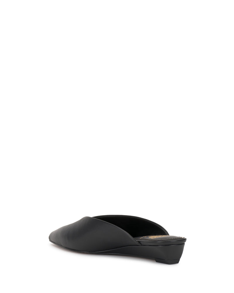 The Vinia Mule by Vince Camuto, in black with a low heel and pointed toe, is shown from the back at a slight left angle against a plain white background.