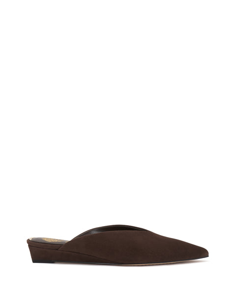The Vinia Mule by Vince Camuto is a single brown suede slip-on shoe featuring a low heel and pointed toe, captured against a white background.