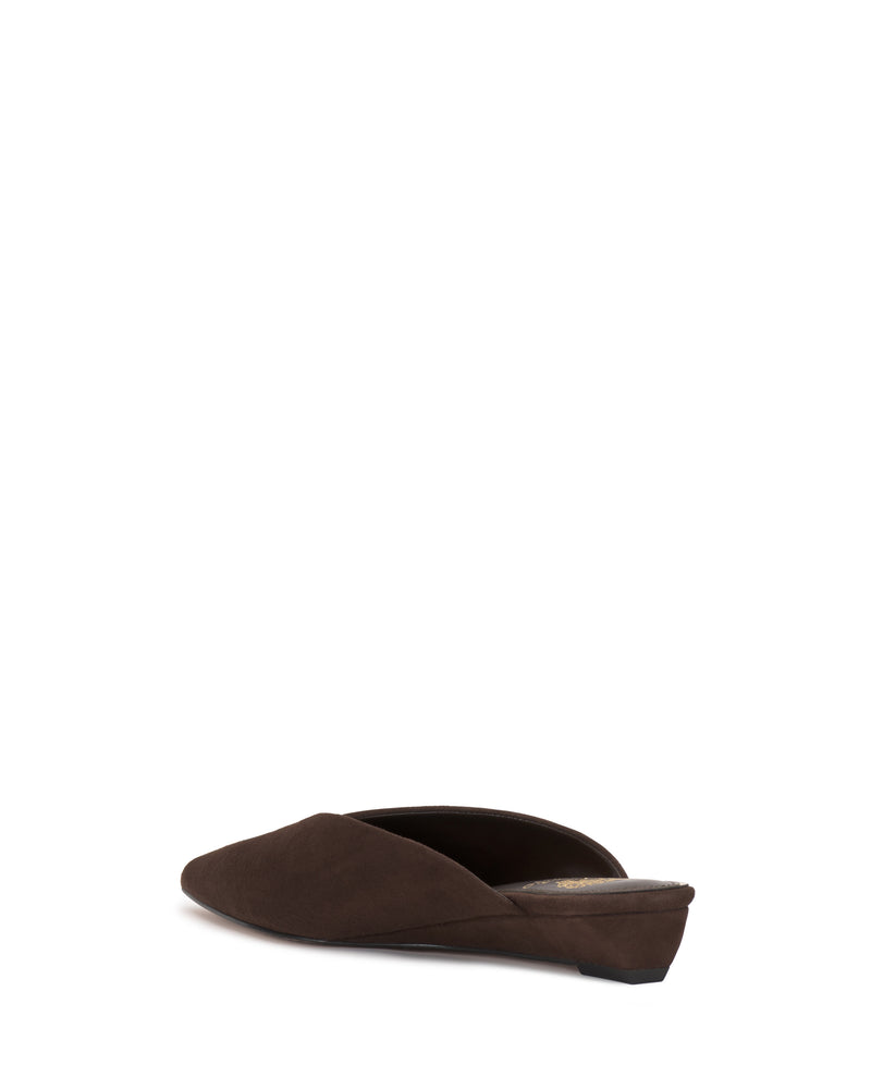 The Vinia Mule by Vince Camuto is a brown suede pointed-toe mule with a low heel, displayed in profile against a white background.