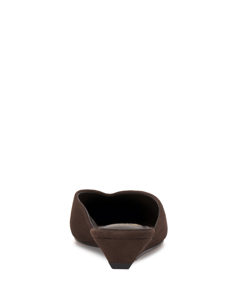 A rear view of one brown Vinia Mule slip-on shoe by Vince Camuto, featuring a low wedge heel, set against a plain white background.