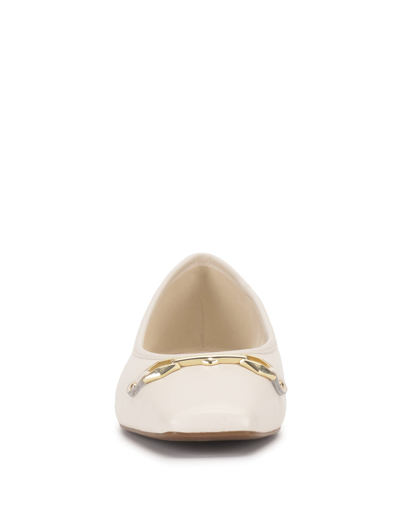 Front view of the Vince Camuto Virna Link Ballet Flat in white, showcasing a pointed toe and polished gold metal hardware accent across the upper for versatile style.