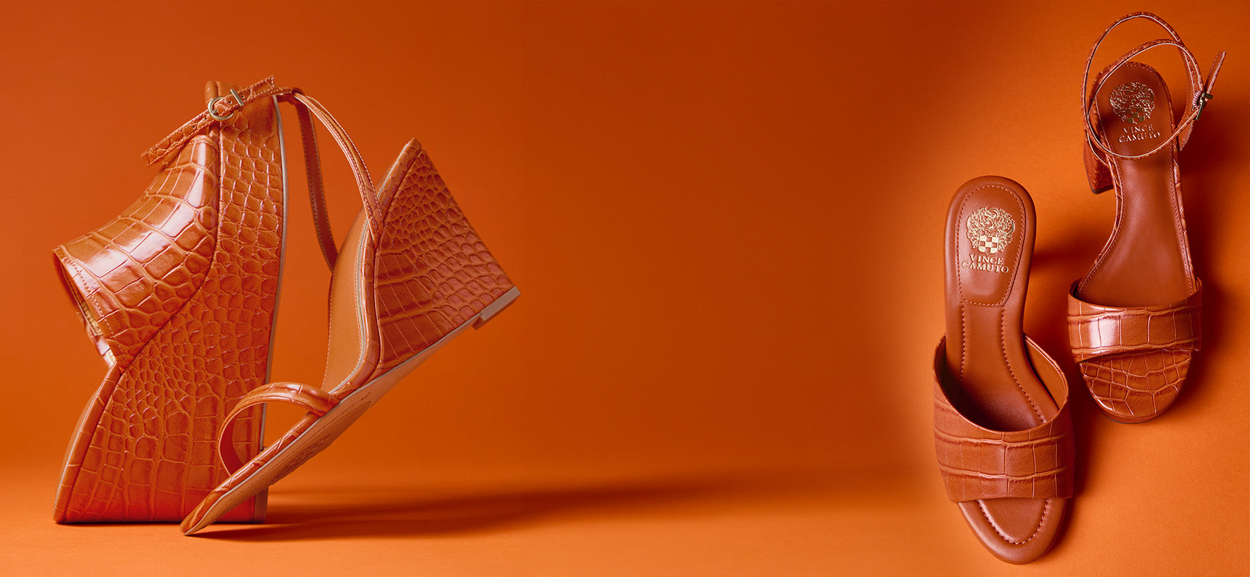 Brown wedge sandals on an orange background