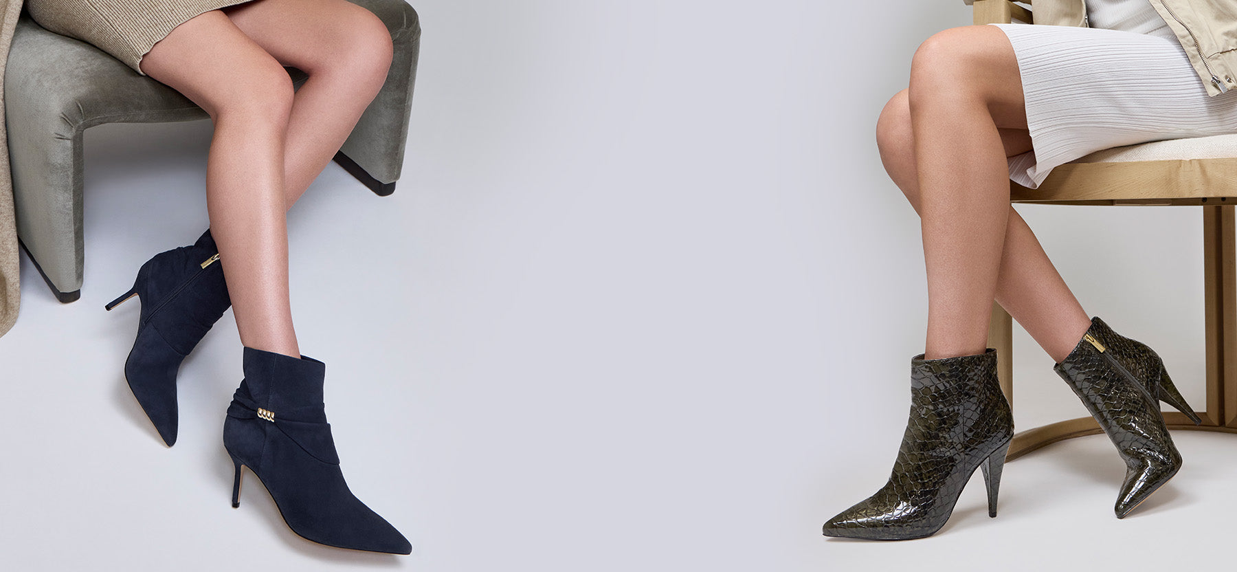 A split-screen lifestyle image showing two models wearing ankle boots. On the left, a model sits on a gray chair wearing dark navy blue pointed-toe ankle boots with a small gold buckle.