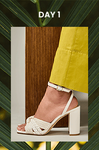 crop of white high heeled shoe
