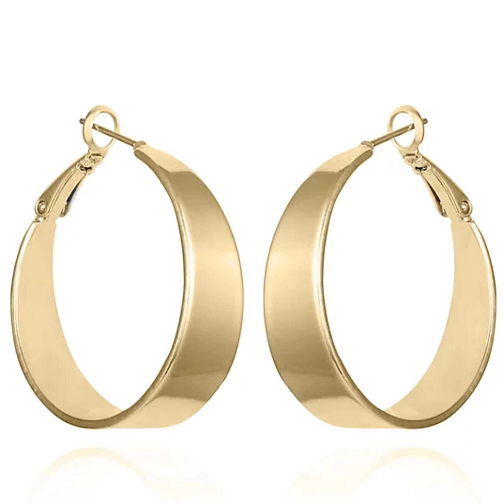The Vince Camuto Band Thick Hoop Earrings feature a classic gold-tone design with smooth, wide bands, shown against a white background.