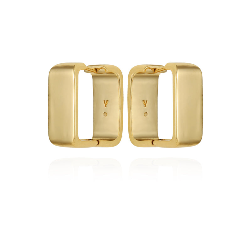 The Vince Camuto Brass Rectangle Hoop Earrings feature a chunky, gold-tone design with a smooth, polished finish. Displayed upright and facing each other against a white background, these vintage-inspired hoops add timeless elegance.