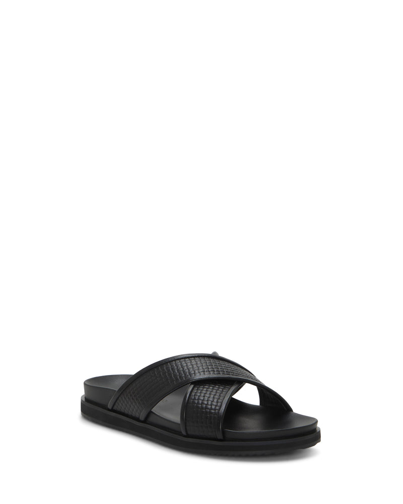 The Vince Camuto Men's Dabor Cross-Band Sandal in black showcases two wide, textured crisscross straps and a flat sole, presented against a white background for a classic look.