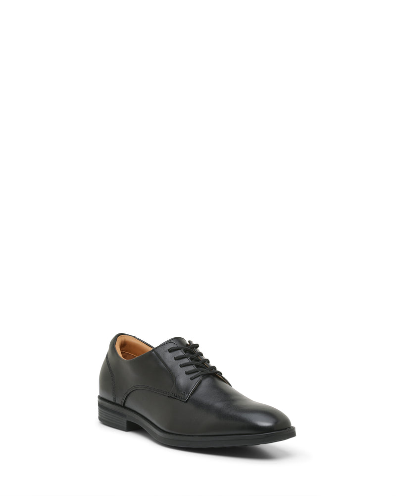 The Vince Camuto Men’s Draymand Oxford is a black leather lace-up dress shoe featuring a low heel and tan interior, displayed against a white background.