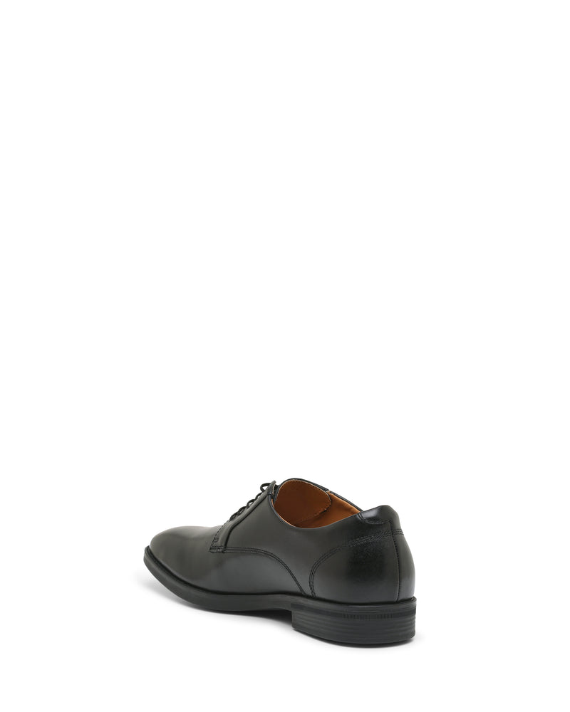 A single Vince Camuto Men’s Draymand Oxford black lace-up dress shoe is angled to display its side and back heel, set against a plain white background.