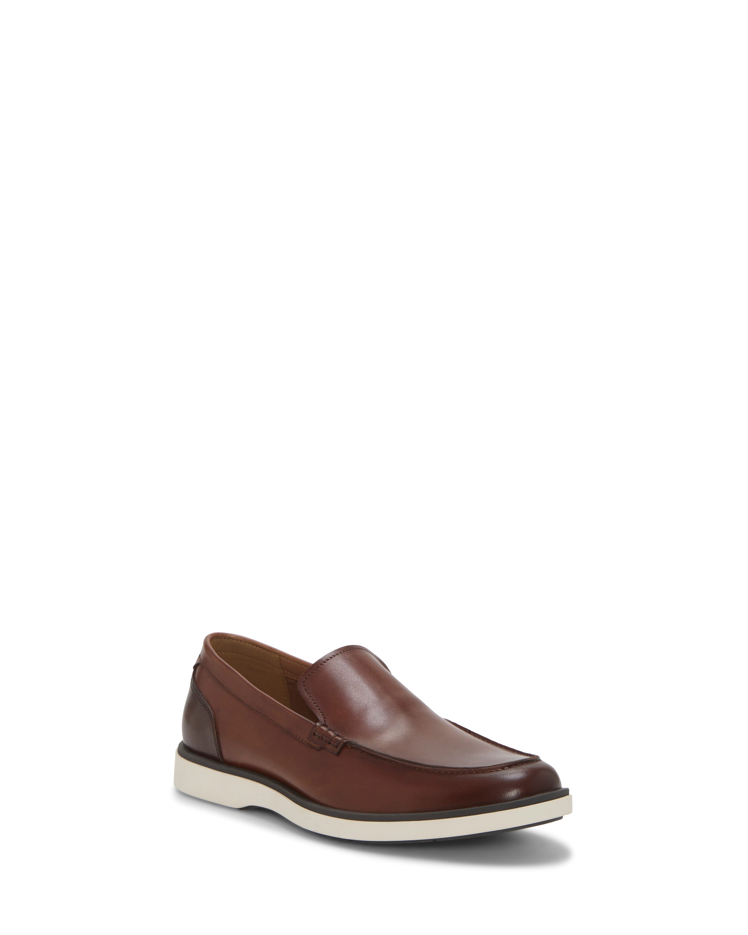 The Vince Camuto Men's Sevrin Casual Loafer is a brown leather shoe with a low heel, white rubber sole, and EVA insole cushioning for comfort, shown against a plain white background.