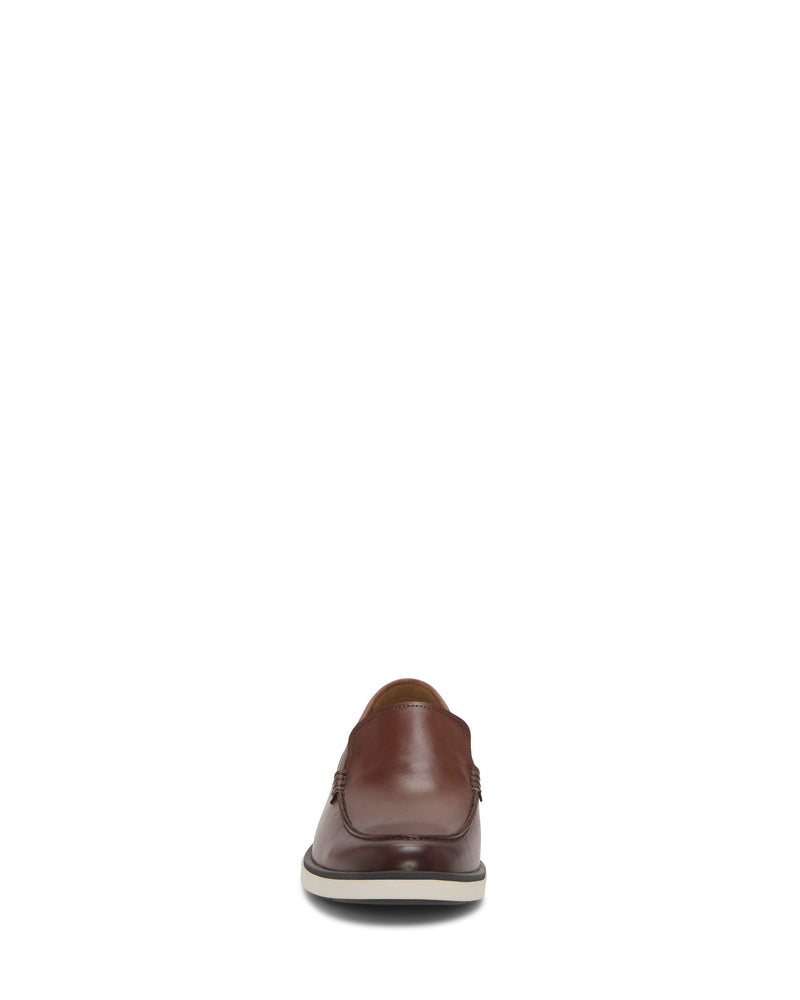 The Vince Camuto Men's Sevrin Casual Loafer is shown from the back on a white background, highlighting its brown leather heel and sole details for a versatile style.