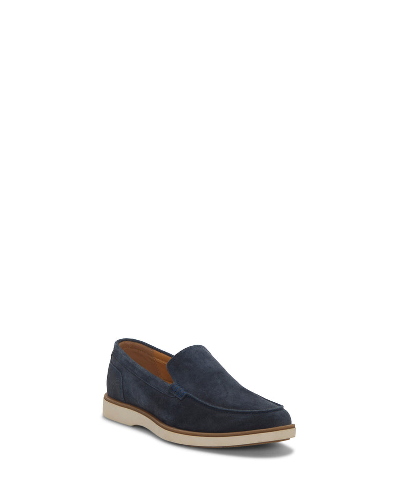 The Vince Camuto Men's Sevrin Casual Loafer in dark blue suede features a tan rubber sole and comfortable EVA insole, displayed on a white background to highlight the outer side and front.