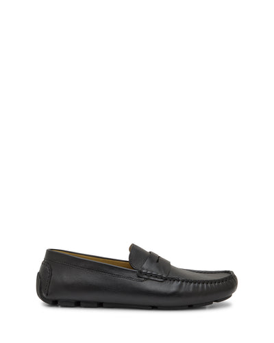 The Vince Camuto Men's Vitzroy Slip-On features black leather, a moccasin-style toe, low heel, and rubber sole—shown in side profile against a white background for a versatile look fit for any occasion.