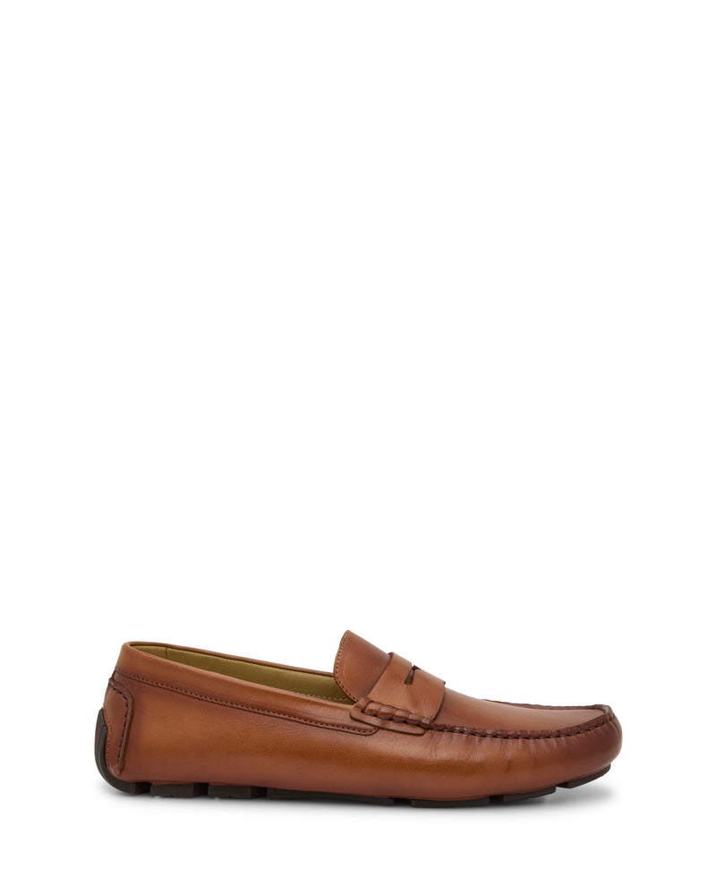 The Vince Camuto Men's Vitzroy Slip-On, a brown leather loafer with a moccasin toe, penny strap detail, and rubber sole, is displayed on a plain white background.