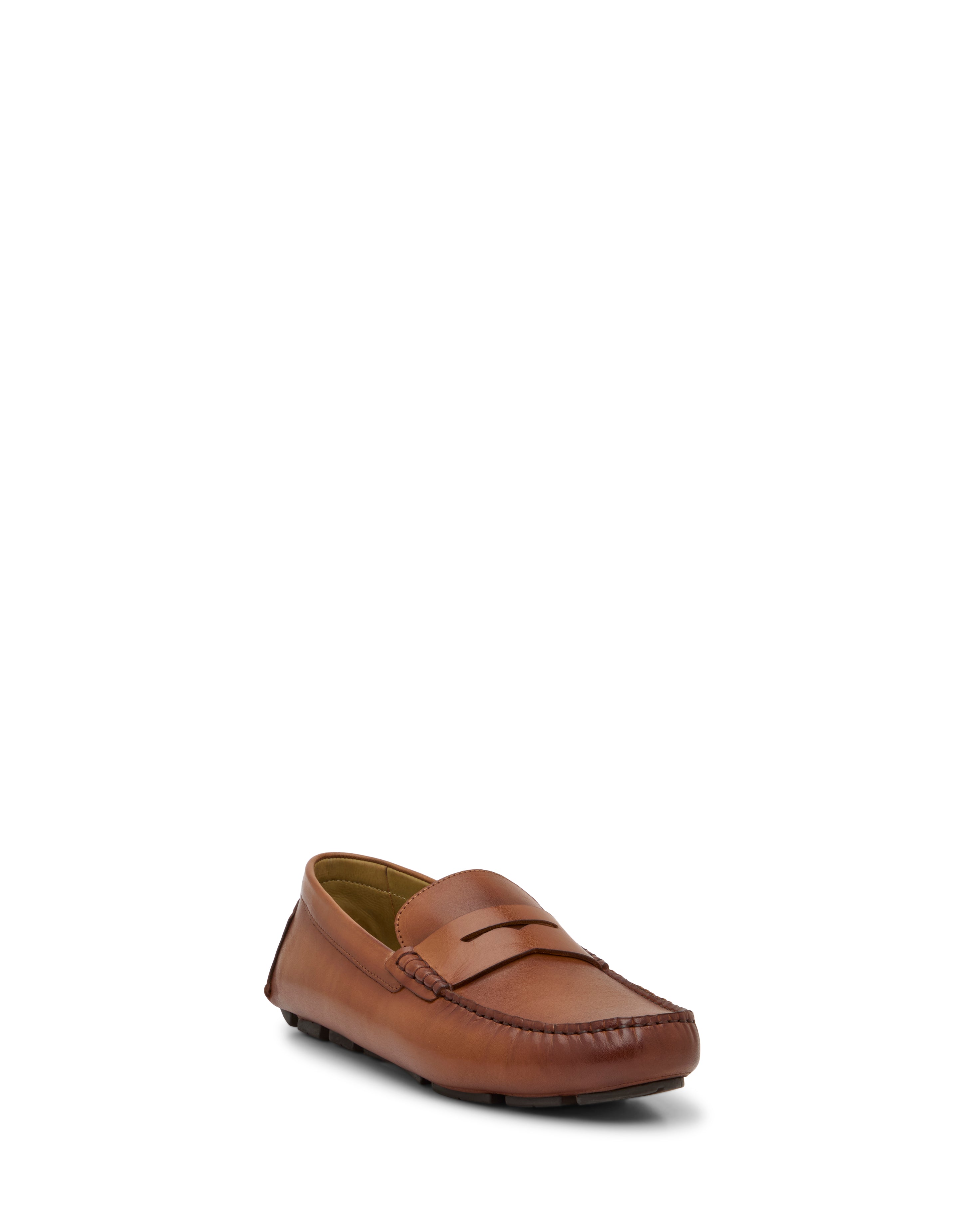 The Vince Camuto Men's Vitzroy Slip-On is shown in brown leather with a classic penny slot, visible stitching, and a low heel against a white background, highlighting its versatile and essential silhouette.