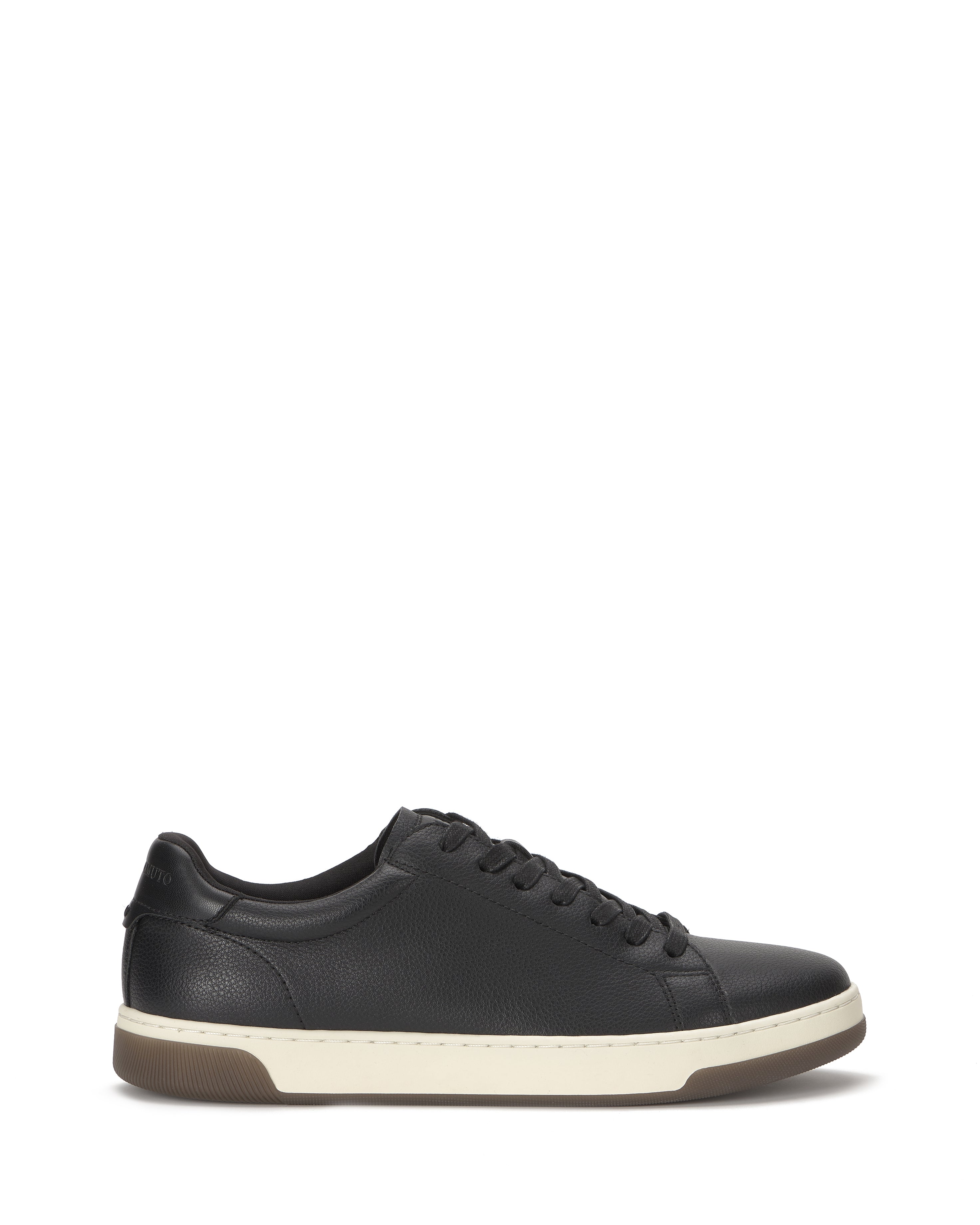 The Vince Camuto Men's Wynsten Sneaker is a black low-top with white sole and black laces, shown in side profile on a white background. It features an EVA insole for comfort, making it ideal as an everyday casual sneaker.