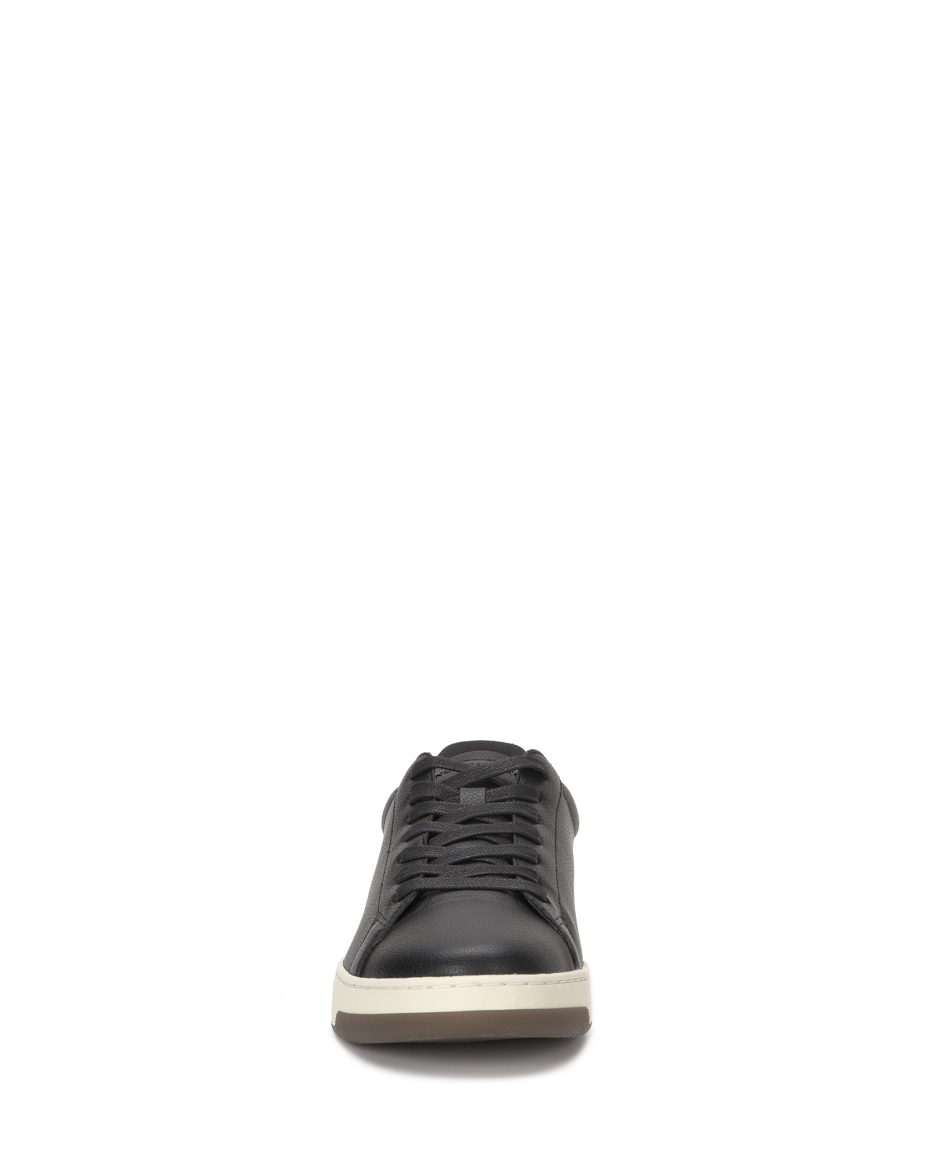 The Vince Camuto Men's Wynsten Sneaker is a black casual shoe with black laces, a white sole, and a comfortable EVA insole, shown from the front against a plain white background.