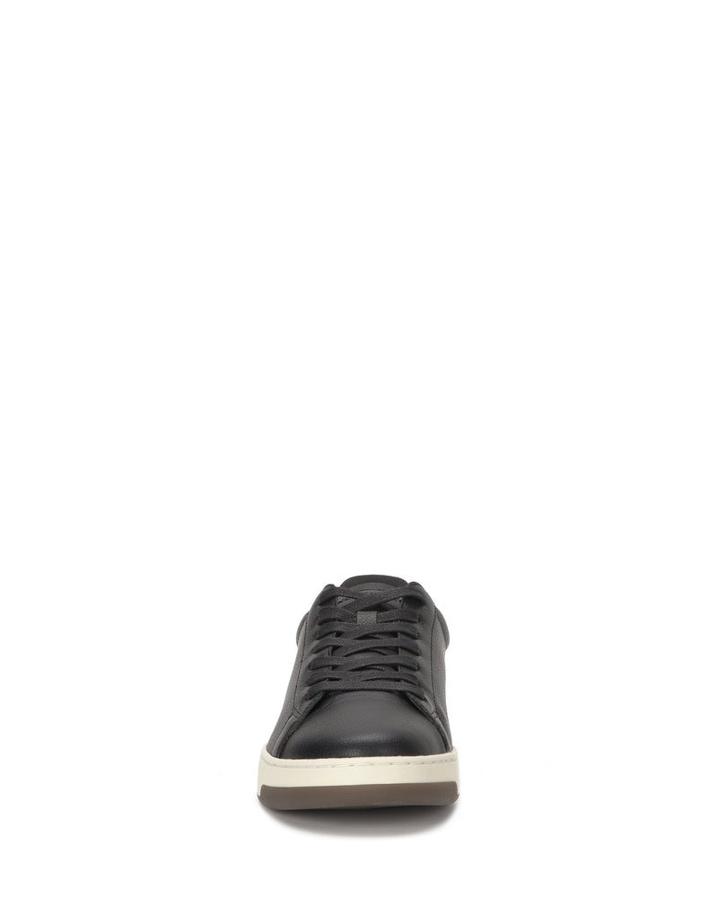 The Vince Camuto Men's Wynsten Sneaker is a black casual shoe with black laces, a white sole, and a comfortable EVA insole, shown from the front against a plain white background.