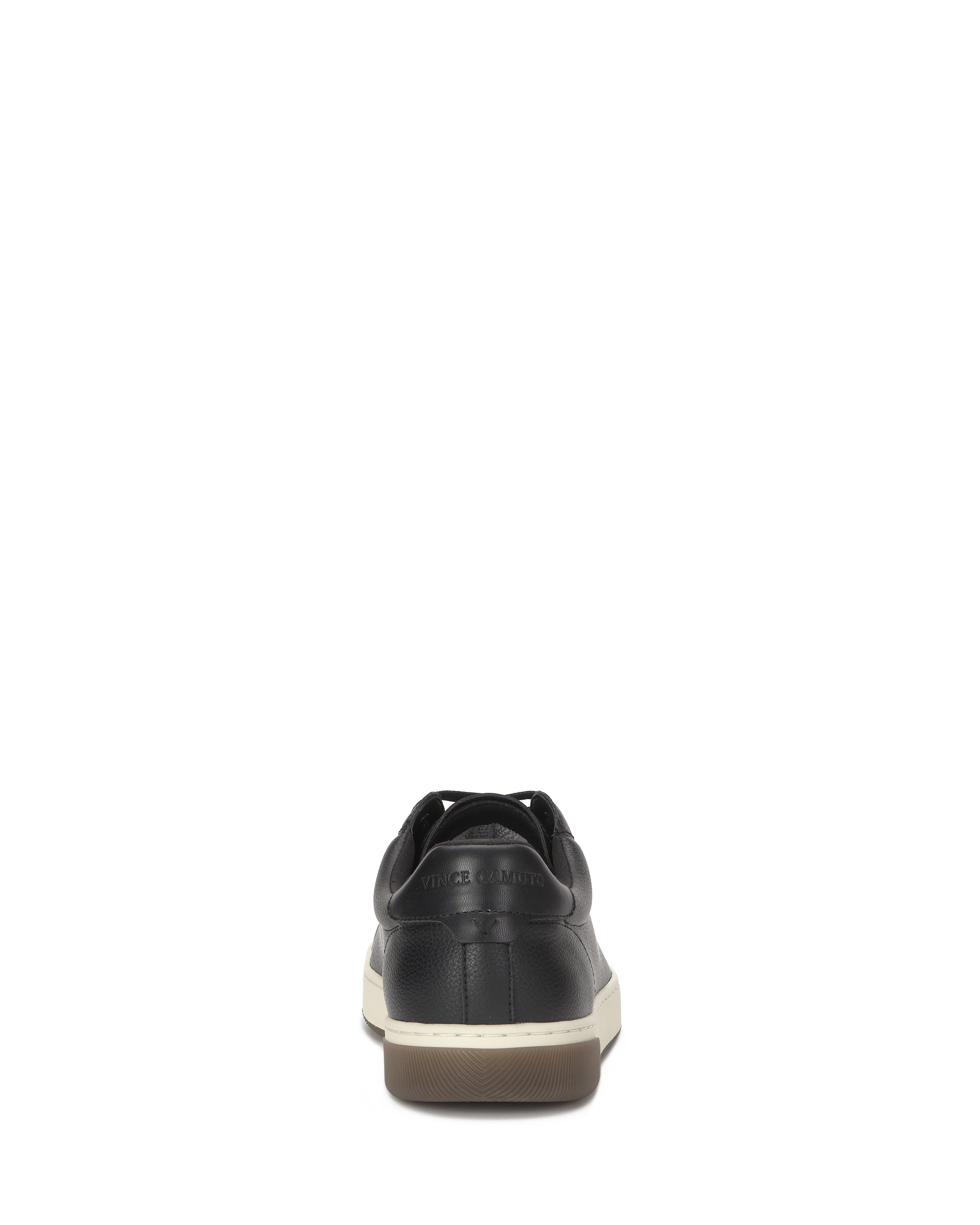 Rear view of the Vince Camuto Men's Wynsten Sneaker, a black leather casual shoe with a white sole, brown outsole, and EVA insole, shown against a plain white background.