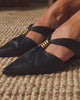 women in various shots displaying shoes 